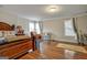 Spacious bedroom with hardwood floors and ample natural light at 55 Rainey Ridge Dr, Oxford, GA 30054