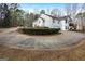 Curved driveway leading to a two-story house at 55 Rainey Ridge Dr, Oxford, GA 30054