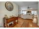 Bright entryway with hardwood floors and view into living room at 55 Rainey Ridge Dr, Oxford, GA 30054