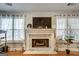 White marble fireplace with a large hearth in a living room setting at 55 Rainey Ridge Dr, Oxford, GA 30054