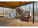 Covered patio with steps leading to yard at 55 Rainey Ridge Dr, Oxford, GA 30054
