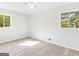 Bright bedroom with hardwood floors and ceiling fan at 151 Andover Dr, Jonesboro, GA 30238