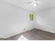 Simple bedroom with hardwood floors and a window at 151 Andover Dr, Jonesboro, GA 30238