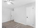 Well-lit bedroom featuring hardwood floors and closets at 151 Andover Dr, Jonesboro, GA 30238