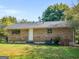 Brick house exterior with a large backyard at 151 Andover Dr, Jonesboro, GA 30238