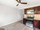 Bright kitchen with stainless steel appliances and wood cabinets at 151 Andover Dr, Jonesboro, GA 30238