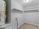 Functional laundry room with shelving and water hookups at 151 Andover Dr, Jonesboro, GA 30238