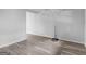 Bright living room with gray laminate floors at 151 Andover Dr, Jonesboro, GA 30238