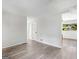 Open living area with gray floors and access to other rooms at 151 Andover Dr, Jonesboro, GA 30238