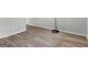 Gray laminate floors and a floor lamp at 151 Andover Dr, Jonesboro, GA 30238