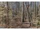 Secluded wooded lot with mature trees, offering ultimate privacy at 2671 Eastmont Trl, Snellville, GA 30039
