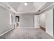 Well-lit bedroom with tray ceiling and access to bathroom at 2671 Eastmont Trl, Snellville, GA 30039