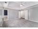 Bright bedroom with trey ceiling, carpet, and access to bathroom at 2671 Eastmont Trl, Snellville, GA 30039