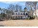 Gray two-story house with white trim and a landscaped yard at 2671 Eastmont Trl, Snellville, GA 30039