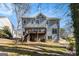 Two-story home with a large back deck and a private, wooded backyard at 2671 Eastmont Trl, Snellville, GA 30039