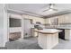 Kitchen with island, stainless steel appliances, and access to dining room at 2671 Eastmont Trl, Snellville, GA 30039