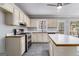 Kitchen boasts stainless steel appliances and an island at 2671 Eastmont Trl, Snellville, GA 30039