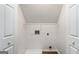 Laundry closet with shelving and hookups at 2671 Eastmont Trl, Snellville, GA 30039