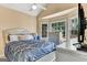 Bright bedroom with bay window and ceiling fan at 4335 Burgomeister Pl, Snellville, GA 30039