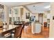 Bright dining area with hardwood floors and views of the living room at 4335 Burgomeister Pl, Snellville, GA 30039