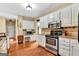 Spacious kitchen with granite countertops and stainless steel appliances at 4335 Burgomeister Pl, Snellville, GA 30039