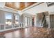 Elegant dining room with hardwood floors, wood ceiling, and large windows at 1689 Nebo Rd, Dallas, GA 30157