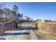 Stone pillars and wrought iron gate leading to the house at 1689 Nebo Rd, Dallas, GA 30157