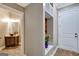 Foyer with built-in shelving and hardwood flooring at 1689 Nebo Rd, Dallas, GA 30157