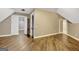 Open hallway with wood floors and access to bedrooms at 1689 Nebo Rd, Dallas, GA 30157