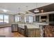 Large kitchen island with granite countertop and farmhouse sink at 1689 Nebo Rd, Dallas, GA 30157