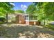 Brick house exterior with a screened porch and backyard at 241 Simon Ter, Atlanta, GA 30338