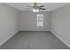Spacious bedroom with ceiling fan and carpet at 625 Armitage Way, Stockbridge, GA 30281