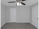 Bedroom with two closets and ceiling fan at 625 Armitage Way, Stockbridge, GA 30281