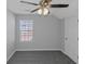 Bedroom with ceiling fan and window at 625 Armitage Way, Stockbridge, GA 30281