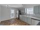 Renovated kitchen with light gray cabinets and stainless steel appliances at 625 Armitage Way, Stockbridge, GA 30281