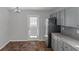 Renovated kitchen with light gray cabinets and stainless steel appliances at 625 Armitage Way, Stockbridge, GA 30281