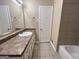 Bathroom boasts a vanity, toilet and separate tub at 3780 Cedar Hurst Way, South Fulton, GA 30349
