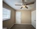 Simple bedroom with ceiling fan, neutral walls, and carpet at 3780 Cedar Hurst Way, South Fulton, GA 30349