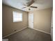 Simple bedroom with ceiling fan, neutral walls, and carpet at 3780 Cedar Hurst Way, South Fulton, GA 30349