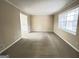Living room with large window and carpet at 3780 Cedar Hurst Way, South Fulton, GA 30349