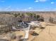 Aerial view of a house with detached garage and large lot at 295 W 5 Hwy, Roopville, GA 30170