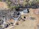 Aerial view of house, detached garage, and land at 295 W 5 Hwy, Roopville, GA 30170