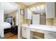 Bathroom with vanity, mirror, and access to bedroom at 295 W 5 Hwy, Roopville, GA 30170