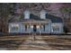 Charming two-story house with front porch and landscaping at 295 W 5 Hwy, Roopville, GA 30170