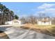 Property with two buildings and a long driveway at 295 W 5 Hwy, Roopville, GA 30170