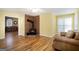 Gathering room with wood burning stove and hardwood floors at 295 W 5 Hwy, Roopville, GA 30170