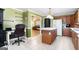 Kitchen features island, ample cabinetry, and stainless steel appliances at 295 W 5 Hwy, Roopville, GA 30170