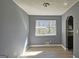 Bright dining area with gray walls and wood-look flooring at 6665 Cedar Hurst Trl, College Park, GA 30349