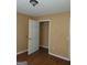 Bedroom with wood floors and a closet at 20 Tara Way, Covington, GA 30016