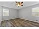 Spacious bedroom with ceiling fan and vinyl plank flooring at 140 Moseley Dr, Stockbridge, GA 30281